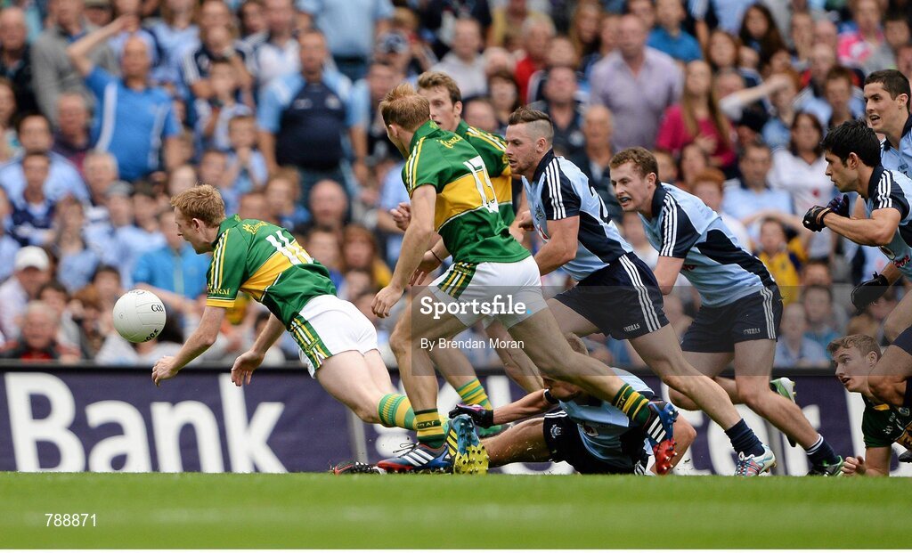 1 September 2013; Colm Cooper, Kerry, is tripped by Jonny Cooper, Dublin, during the second half. GAA Football All-Ireland Senior Championship, Semi-Final, Dublin v Kerry, Croke Park, Dublin. Picture credit: Brendan Moran / SPORTSFILE