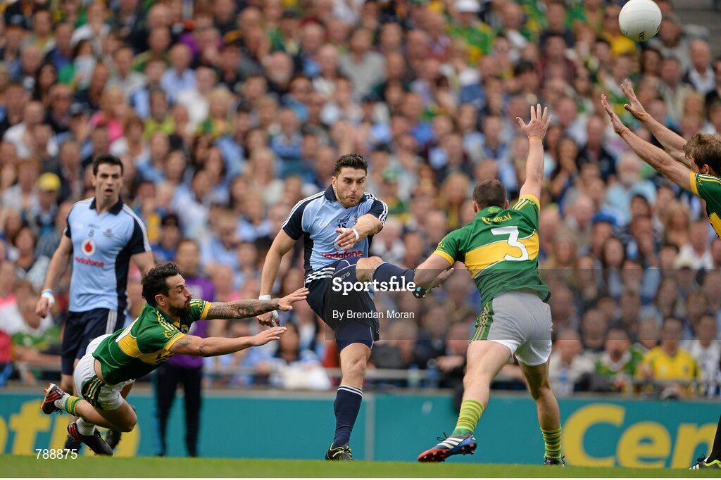 1 September 2013; Bernard Brogan, Dublin, scores a point despite the best efforts of Paul Galvin, left, Mark Griffin, 3, and Donnchadh Walsh, Kerry. GAA Football All-Ireland Senior Championship, Semi-Final, Dublin v Kerry, Croke Park, Dublin. Picture credit: Brendan Moran / SPORTSFILE