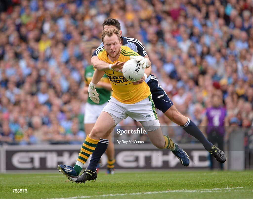 1 September 2013; Kerry goalkeeper Brendan Kealy is tackled by Bernard Brogan, Dublin. GAA Football All-Ireland Senior Championship, Semi-Final, Dublin v Kerry, Croke Park, Dublin. Picture credit: Ray McManus / SPORTSFILE