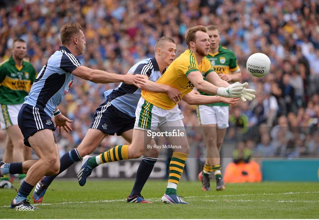 1 September 2013; Kerry goalkeeper, Brendan Kealy, is tackled by Dublin players Paul Flynn and Paul Mannion. GAA Football All-Ireland Senior Championship, Semi-Final, Dublin v Kerry, Croke Park, Dublin. Picture credit: Ray McManus / SPORTSFILE
