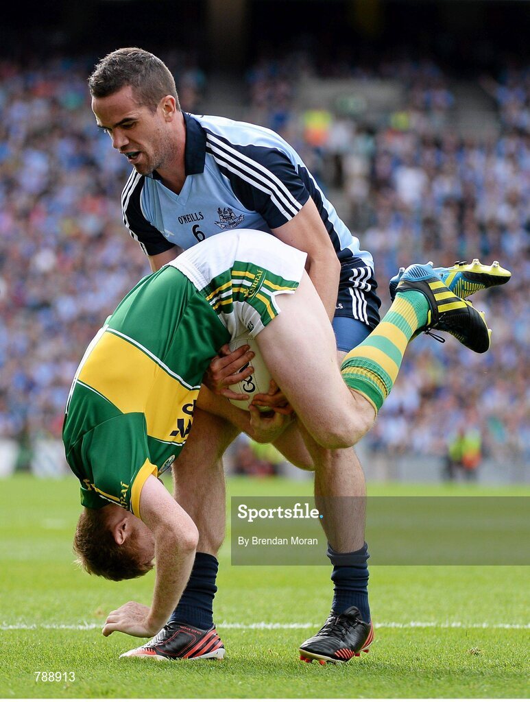 1 September 2013; Ger Brennan, Dublin, attempts to dispossess Colm Cooper, Kerry. GAA Football All-Ireland Senior Championship, Semi-Final, Dublin v Kerry, Croke Park, Dublin. Picture credit: Brendan Moran / SPORTSFILE
