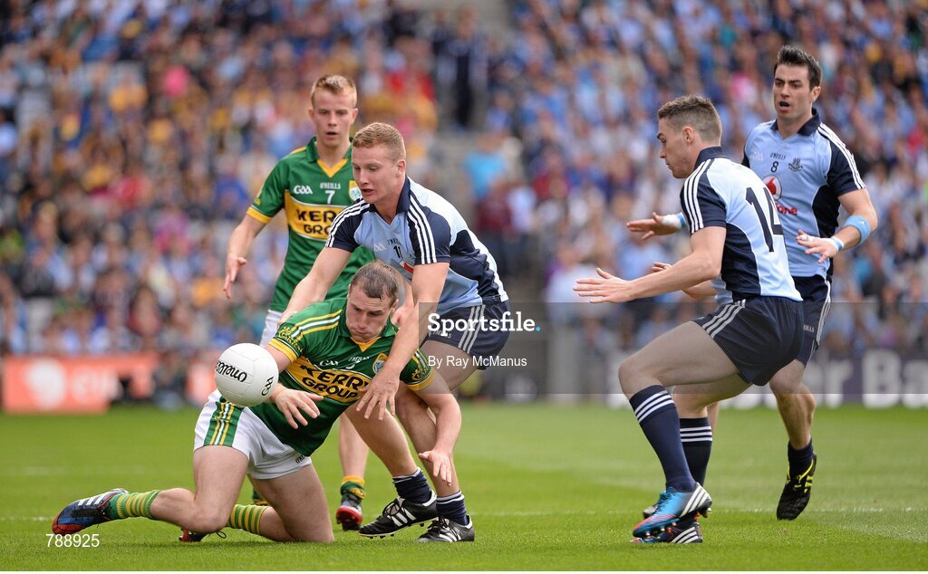 1 September 2013; Mark Griffin, Kerry, supported by Fionn Fitzgerald, in action against Ciarán Kilkenny, Paddy Andrews, and Michael Darragh MacAuley, Dublin. GAA Football All-Ireland Senior Championship, Semi-Final, Dublin v Kerry, Croke Park, Dublin. Picture credit: Ray McManus / SPORTSFILE