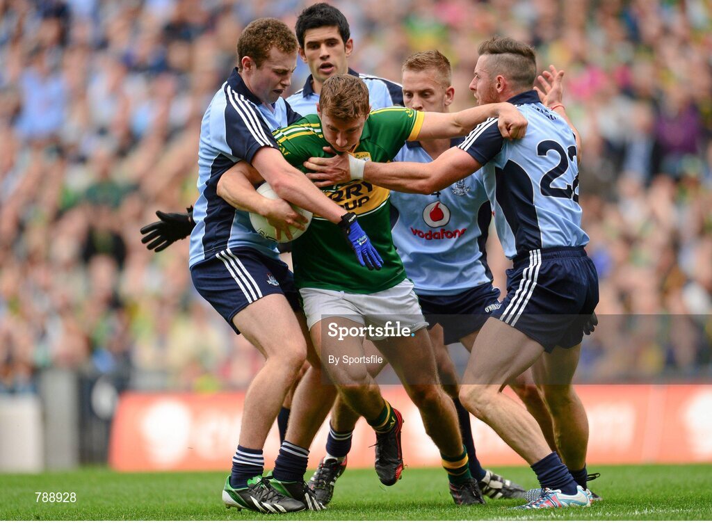 1 September 2013; James O'Donoghue, Kerry, in action against, from left, Jack McCaffrey, Cian O'Sullivan, Jonny Cooper and Philip McMahon, Dublin. GAA Football All-Ireland Senior Championship, Semi-Final, Dublin v Kerry, Croke Park, Dublin. Photo by Sportsfile
