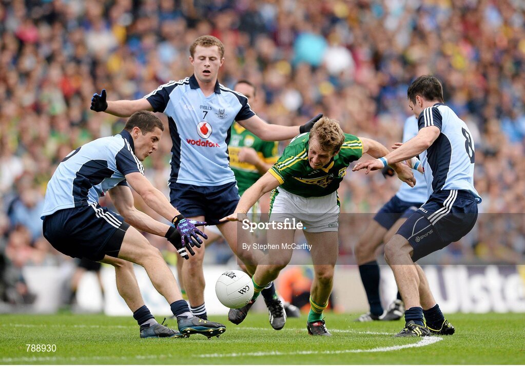 1 September 2013; Donnchadh Walsh, Kerry, in action against Dublin players, from left, Rory O'Carroll, Jack McCaffrey and Michael Darragh Macauley. GAA Football All-Ireland Senior Championship, Semi-Final, Dublin v Kerry, Croke Park, Dublin. Picture credit: Stephen McCarthy / SPORTSFILE