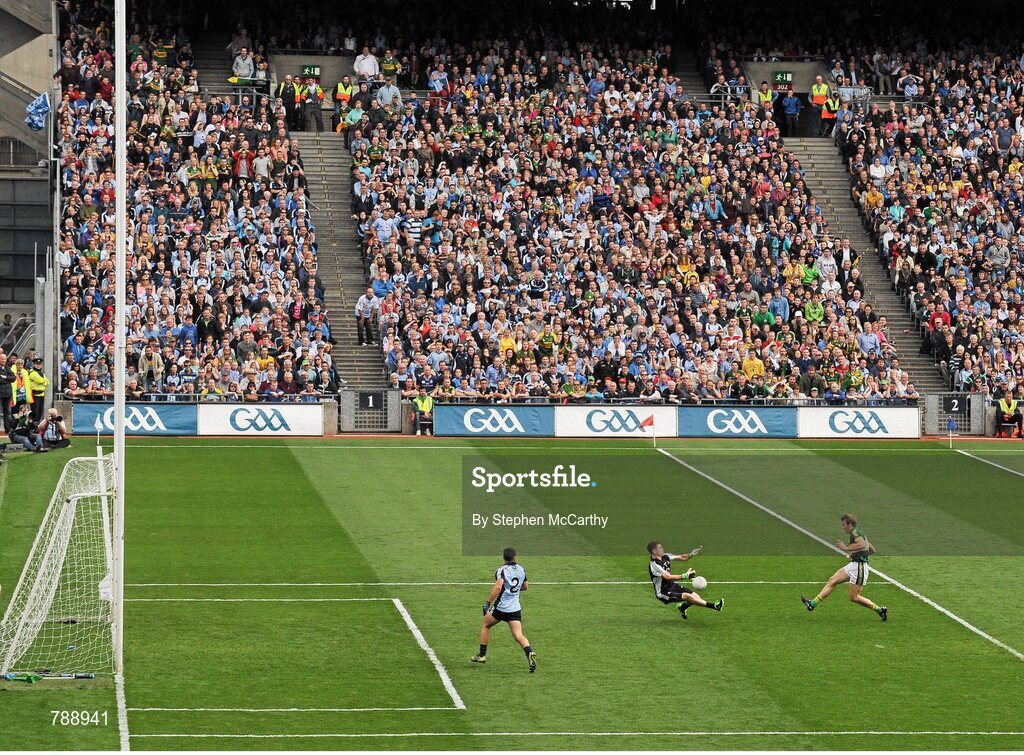 1 September 2013; Donnchadh Walsh, Kerry, shoots to score his side's second goal past Dublin goalkeeper Stephen Cluxton. GAA Football All-Ireland Senior Championship, Semi-Final, Dublin v Kerry, Croke Park, Dublin. Picture credit: Stephen McCarthy / SPORTSFILE