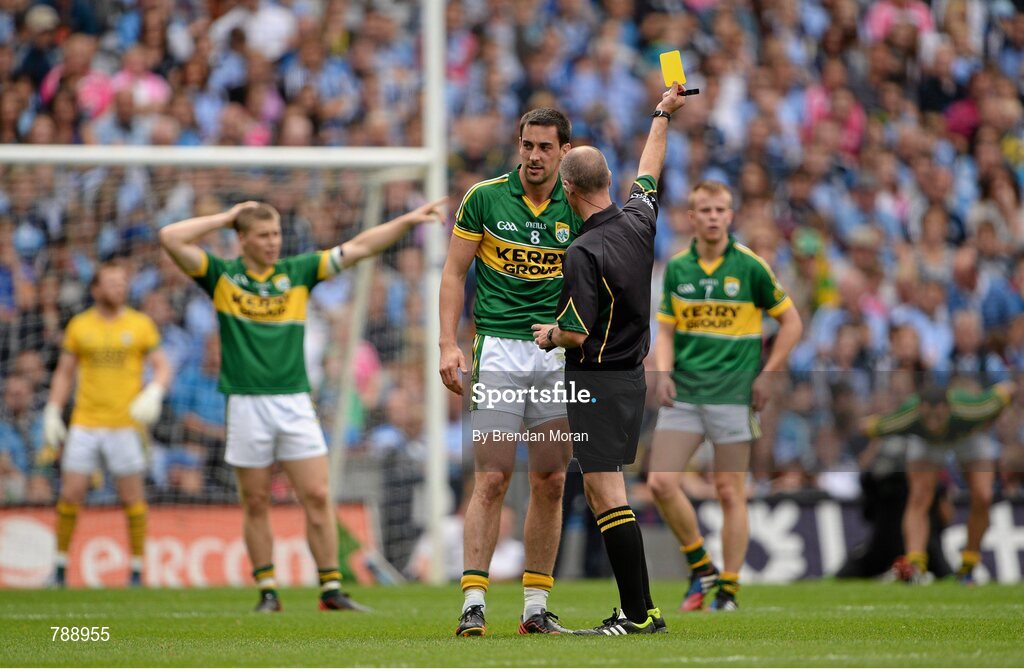 1 September 2013; Anthony Maher, Kerry, is shown a yellow card by referee Cormac Reilly during the first half. GAA Football All-Ireland Senior Championship, Semi-Final, Dublin v Kerry, Croke Park, Dublin. Picture credit: Brendan Moran / SPORTSFILE