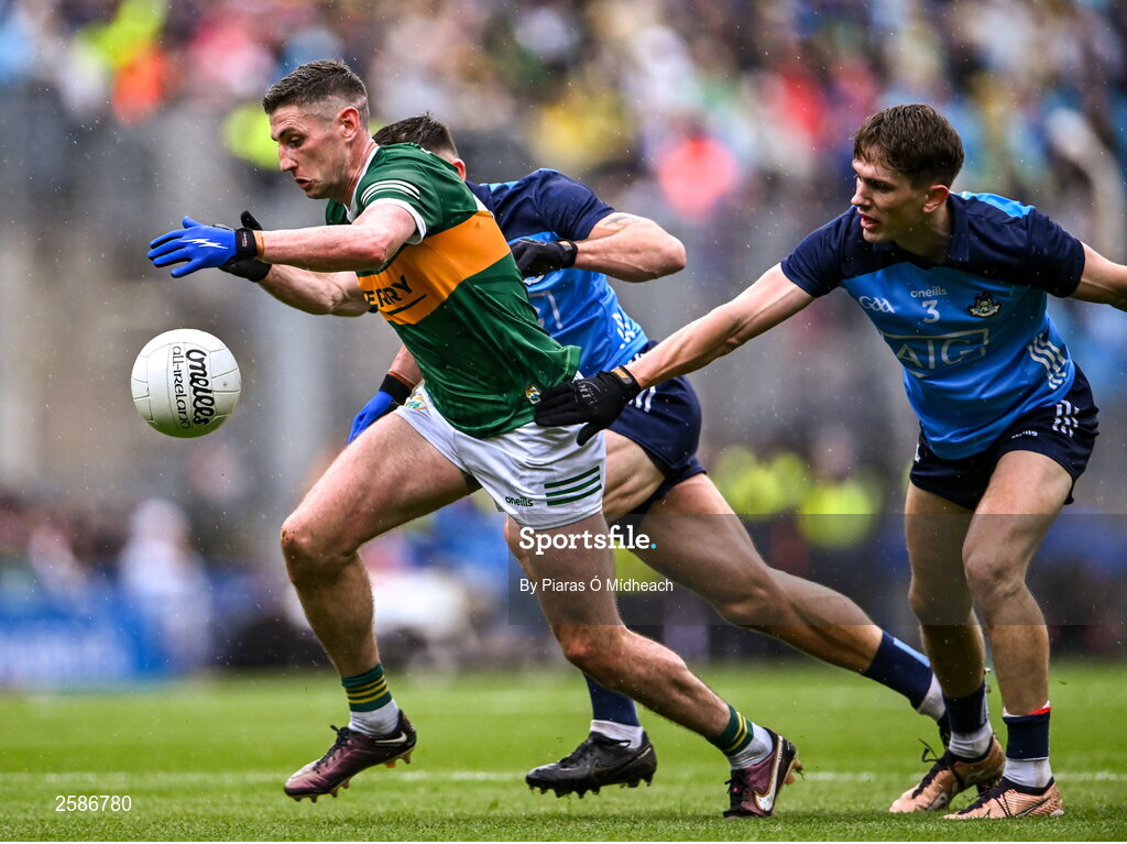 30 July 2023; Paudie Clifford of Kerry in action against David Byrne and Michael Fitzsimons, right, of Dublin during the GAA Football All-Ireland Senior Championship final match between Dublin and Kerry at Croke Park in Dublin. Photo by Piaras Ó Mídheach/Sportsfile