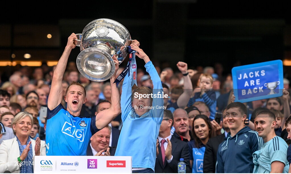 30 July 2023; Paul Mannion of Dublin, and Oisin Deehan, lift the Sam Maguire Cup after the GAA Football All-Ireland Senior Championship final match between Dublin and Kerry at Croke Park in Dublin. Photo by Ramsey Cardy/Sportsfile