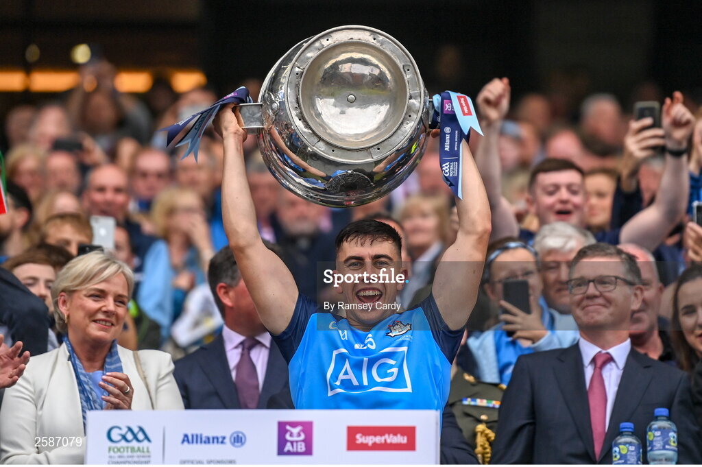30 July 2023; Lorcan O'Dell of Dublin lifts the Sam Maguire Cup after the GAA Football All-Ireland Senior Championship final match between Dublin and Kerry at Croke Park in Dublin. Photo by Ramsey Cardy/Sportsfile