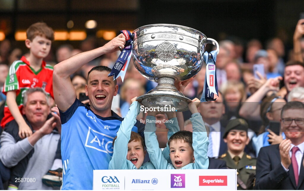 30 July 2023; Cormac Costello of Dublin lifts the Sam Maguire Cup after the GAA Football All-Ireland Senior Championship final match between Dublin and Kerry at Croke Park in Dublin. Photo by Ramsey Cardy/Sportsfile