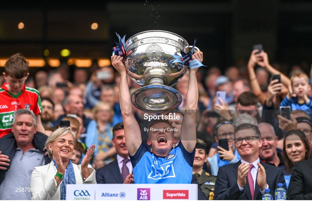 30 July 2023; Cian Murphy of Dublin lifts the Sam Maguire Cup after the GAA Football All-Ireland Senior Championship final match between Dublin and Kerry at Croke Park in Dublin. Photo by Ramsey Cardy/Sportsfile