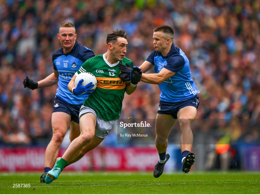 30 July 2023; Paudie Clifford of Kerry is tackled by Eoin Murchan supported by Ciaran Kilkenny during the GAA Football All-Ireland Senior Championship final match between Dublin and Kerry at Croke Park in Dublin. Photo by Ray McManus/Sportsfile