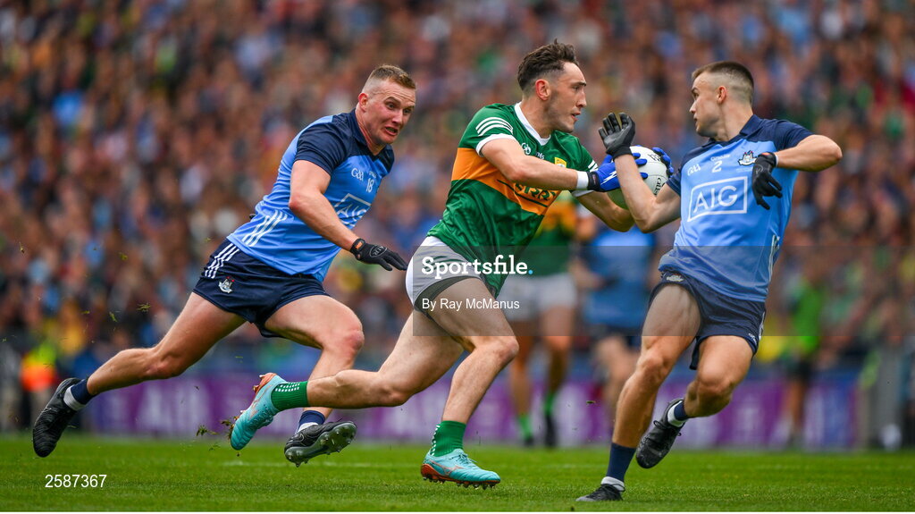 30 July 2023; Paudie Clifford of Kerry slips between Eoin Murchan and Ciaran Kilkenny of Dublin, left, during the GAA Football All-Ireland Senior Championship final match between Dublin and Kerry at Croke Park in Dublin. Photo by Ray McManus/Sportsfile
