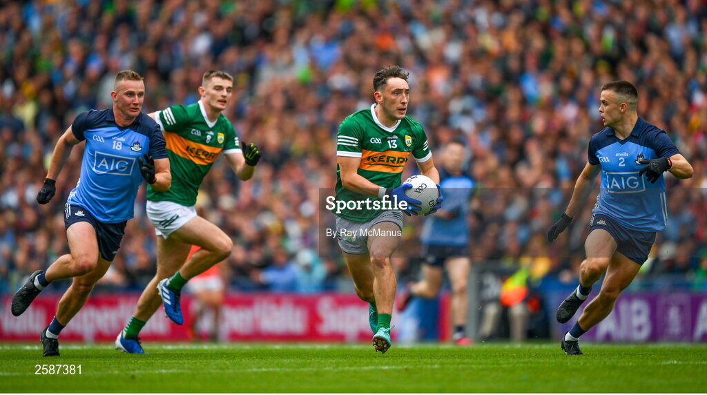 30 July 2023; Paudie Clifford of Kerry in action against Eoin Murchan, right, supported by Ciaran Kilkenny during the GAA Football All-Ireland Senior Championship final match between Dublin and Kerry at Croke Park in Dublin. Photo by Ray McManus/Sportsfile