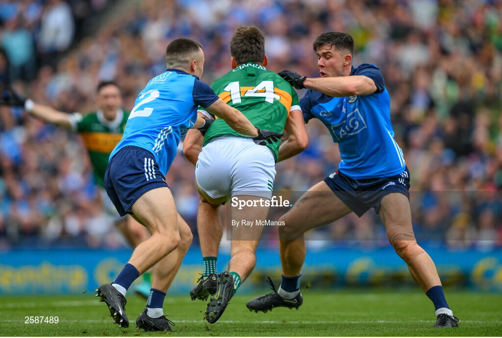 30 July 2023; David Clifford of Kerry is tackled by David Byrne and Eoin Murchan of Dublin, left, during the GAA Football All-Ireland Senior Championship final match between Dublin and Kerry at Croke Park in Dublin. Photo by Ray McManus/Sportsfile