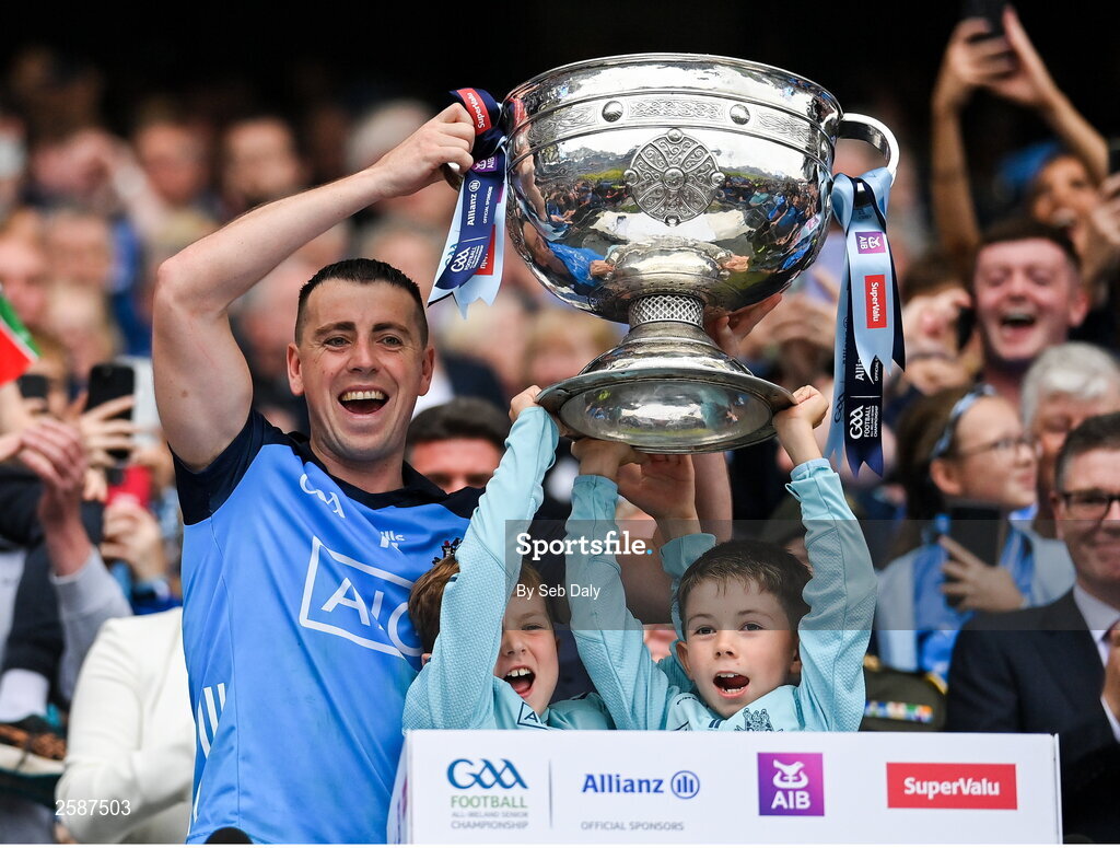 30 July 2023; Cormac Costello of Dublin lifts the Sam Maguire Cup after the GAA Football All-Ireland Senior Championship final match between Dublin and Kerry at Croke Park in Dublin. Photo by Seb Daly/Sportsfile