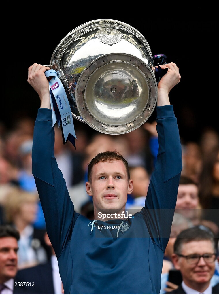 30 July 2023; Senan Forker of Dublin lifts the Sam Maguire Cup after the GAA Football All-Ireland Senior Championship final match between Dublin and Kerry at Croke Park in Dublin. Photo by Seb Daly/Sportsfile