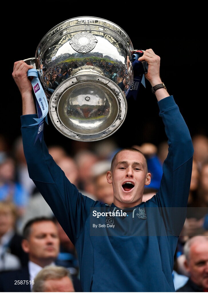 30 July 2023; Peadar Ó Cofaigh Byrne of Dublin lifts the Sam Maguire Cup after the GAA Football All-Ireland Senior Championship final match between Dublin and Kerry at Croke Park in Dublin. Photo by Seb Daly/Sportsfile