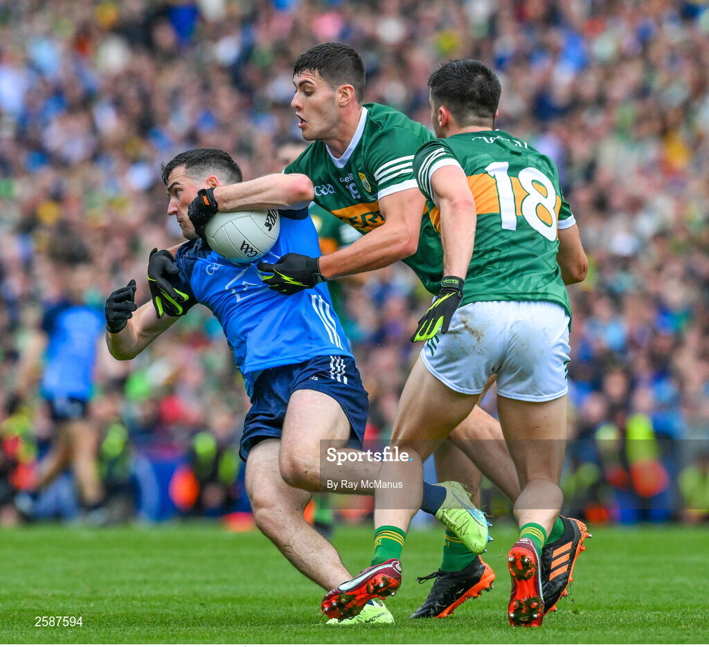 30 July 2023; Colm Basquel of Dublin is tackled by Mike Breen and Brian Ó Beaglaíoch of Kerry late in the GAA Football All-Ireland Senior Championship final match between Dublin and Kerry at Croke Park in Dublin. Photo by Ray McManus/Sportsfile