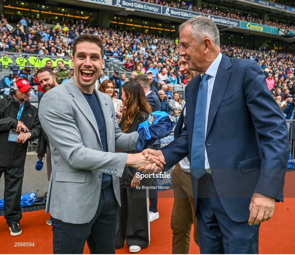 30 July 2023; Outgoing Dublin GAA chief executive John Costello, right, presents a Dublin football jersey to former Mayo footballer and RTE analyst Lee Keegan before the GAA Football All-Ireland Senior Championship final match between Dublin and Kerry at Croke Park in Dublin. Photo by Brendan Moran/Sportsfile