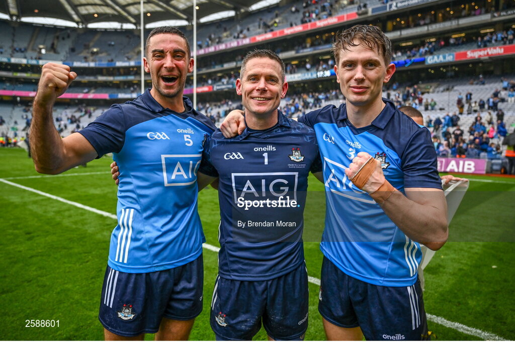 30 July 2023; Dublin nine time All-Ireland medal winners, from left, James McCarthy, Stephen Cluxton and Michael Fitzsimons celebrate after the GAA Football All-Ireland Senior Championship final match between Dublin and Kerry at Croke Park in Dublin. Photo by Brendan Moran/Sportsfile