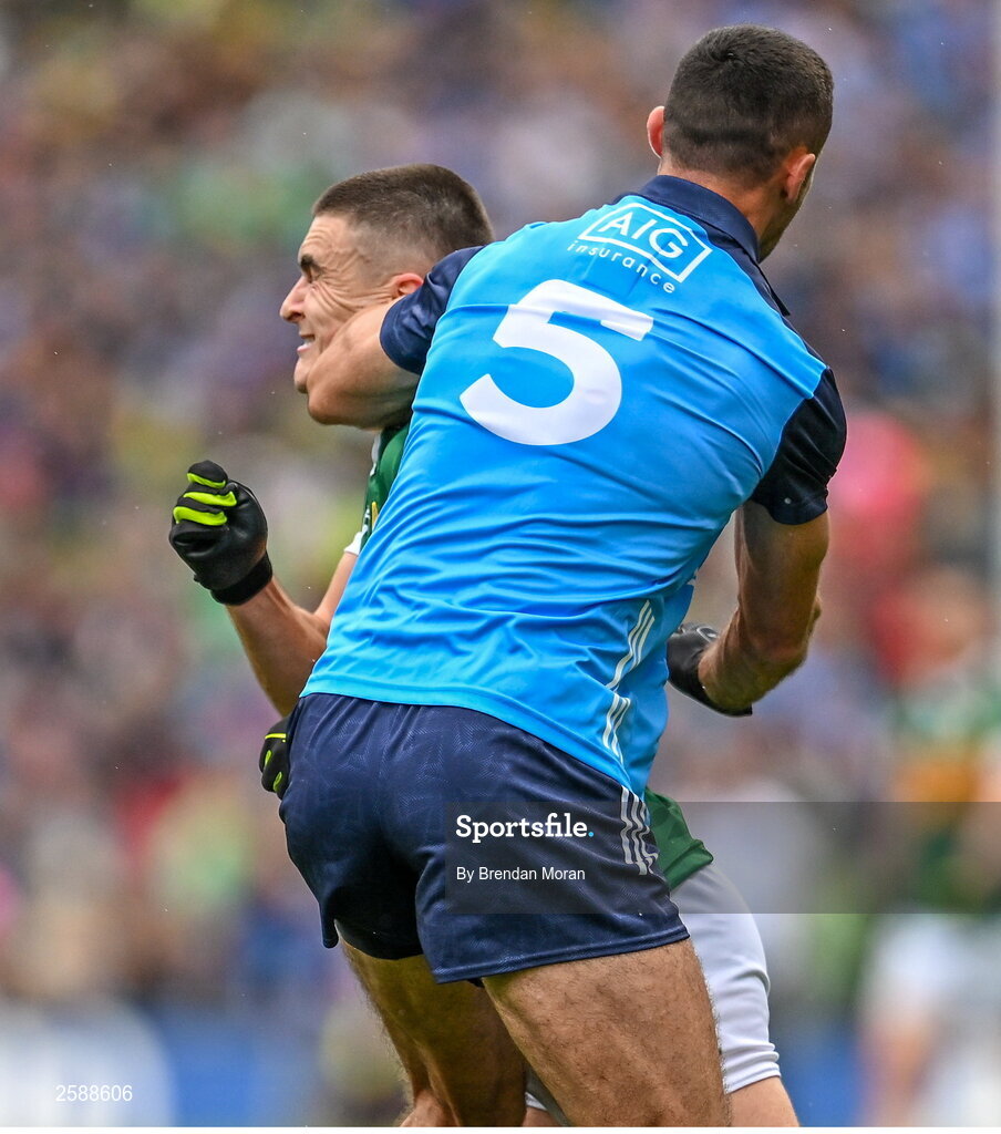 30 July 2023; Sean O'Shea of Kerry is tackled by James McCarthy of Dublin during the GAA Football All-Ireland Senior Championship final match between Dublin and Kerry at Croke Park in Dublin. Photo by Brendan Moran/Sportsfile