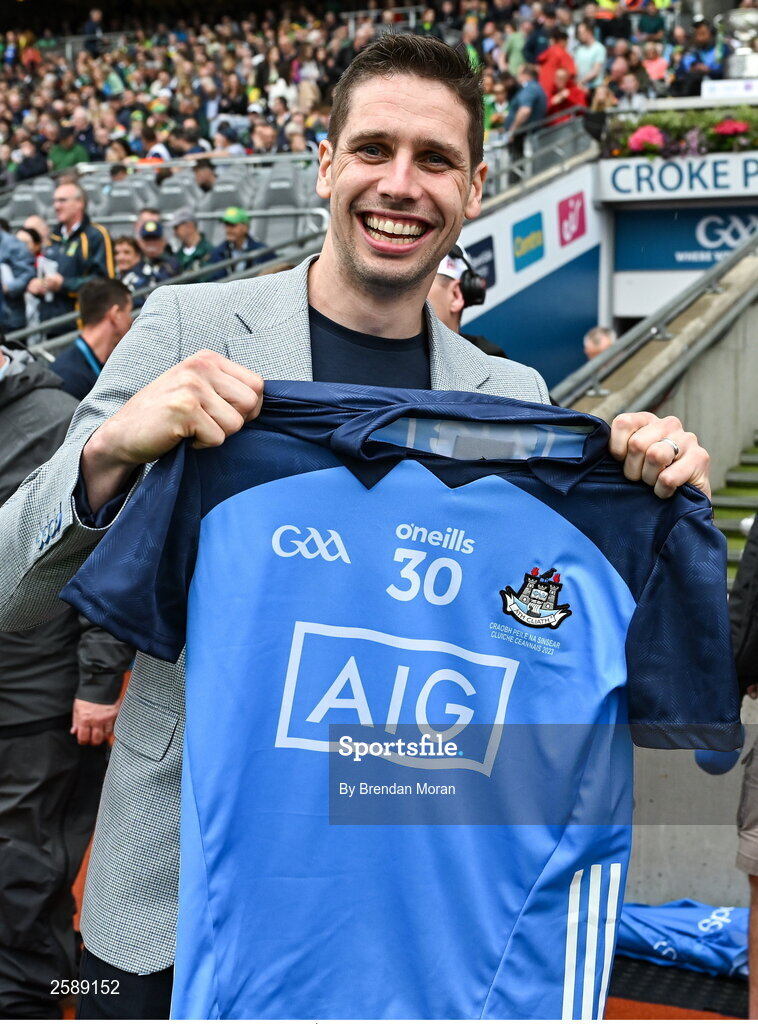30 July 2023; Former Mayo footballer Lee Keegan and RTÉ tv analyst with a Dublin jersey he was presented with before the GAA Football All-Ireland Senior Championship final match between Dublin and Kerry at Croke Park in Dublin. Photo by Brendan Moran/Sportsfile