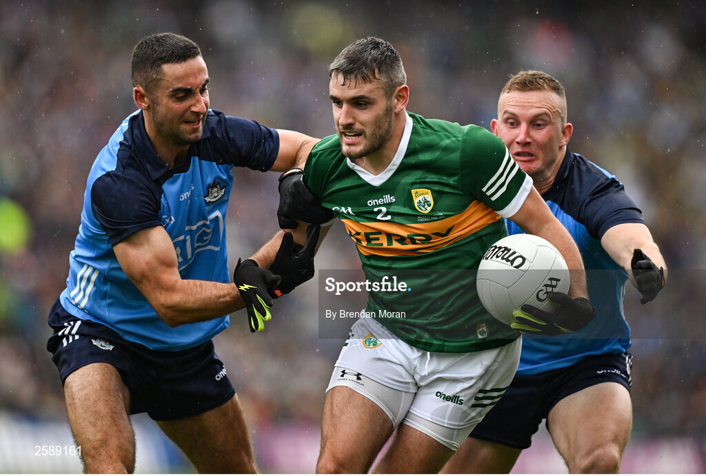 30 July 2023; Graham O'Sullivan of Kerry is tackled by James McCarthy, left, and Ciaran Kilkenny of Dublin during the GAA Football All-Ireland Senior Championship final match between Dublin and Kerry at Croke Park in Dublin. Photo by Brendan Moran/Sportsfile