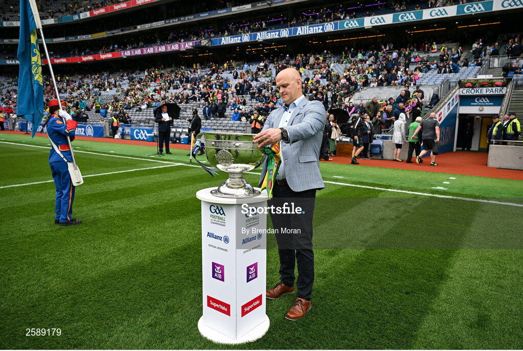 30 July 2023; Captain of the Galway 1998 All-Ireland winning team, Ray Silke, places the Sam Maguire cup on a plinth pitchside before the GAA Football All-Ireland Senior Championship final match between Dublin and Kerry at Croke Park in Dublin. Photo by Brendan Moran/Sportsfile