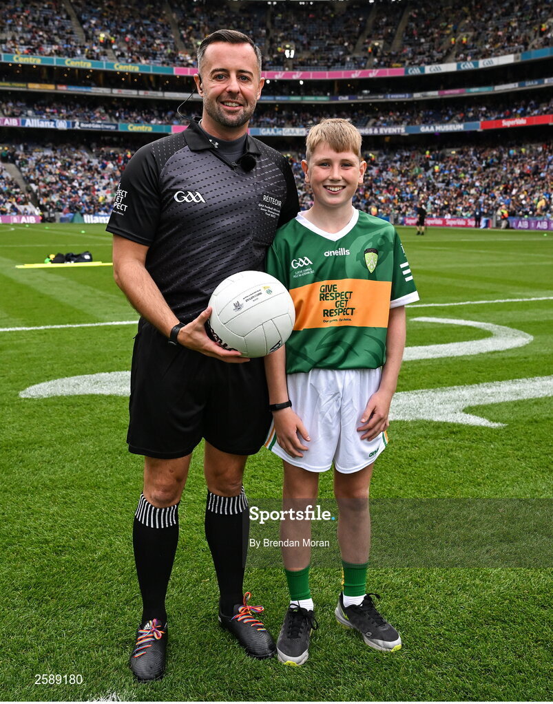 30 July 2023; Joseph Field from Listellick National School in Tralee, Kerry, presents the match ball to referee David Gough before the GAA Football All-Ireland Senior Championship final match between Dublin and Kerry at Croke Park in Dublin. Photo by Brendan Moran/Sportsfile