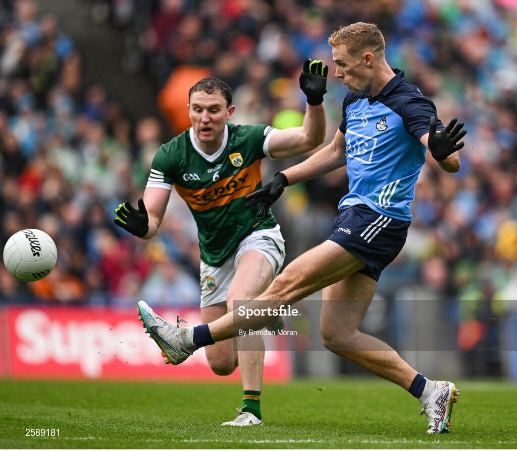 30 July 2023; Con O'Callaghan of Dublin scores his side's second last point during injury time, despite the attentions of Tadhg Morley of Kerry, during the GAA Football All-Ireland Senior Championship final match between Dublin and Kerry at Croke Park in Dublin. Photo by Brendan Moran/Sportsfile