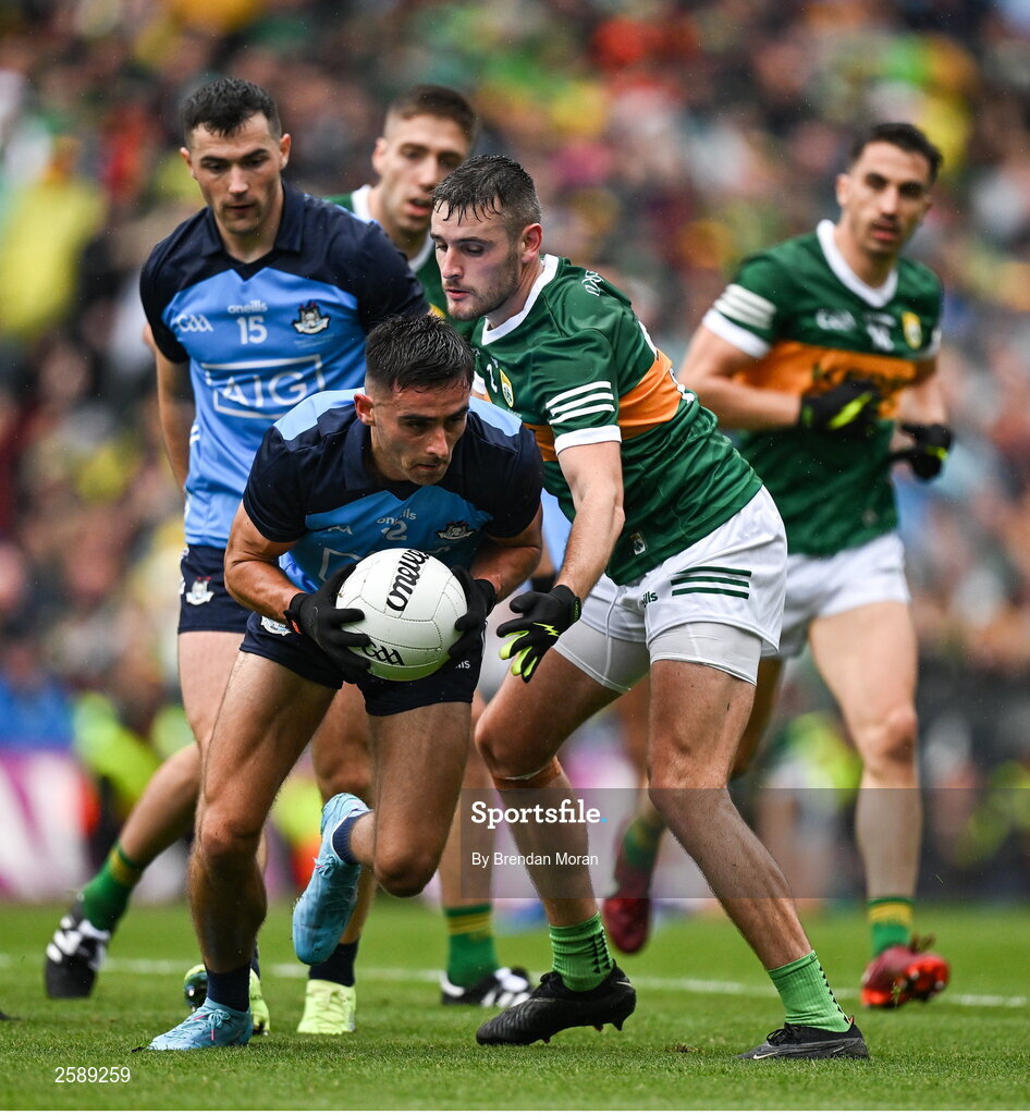 30 July 2023; Niall Scully of Dublin is tackled by Graham O'Sullivan of Kerry during the GAA Football All-Ireland Senior Championship final match between Dublin and Kerry at Croke Park in Dublin. Photo by Brendan Moran/Sportsfile
