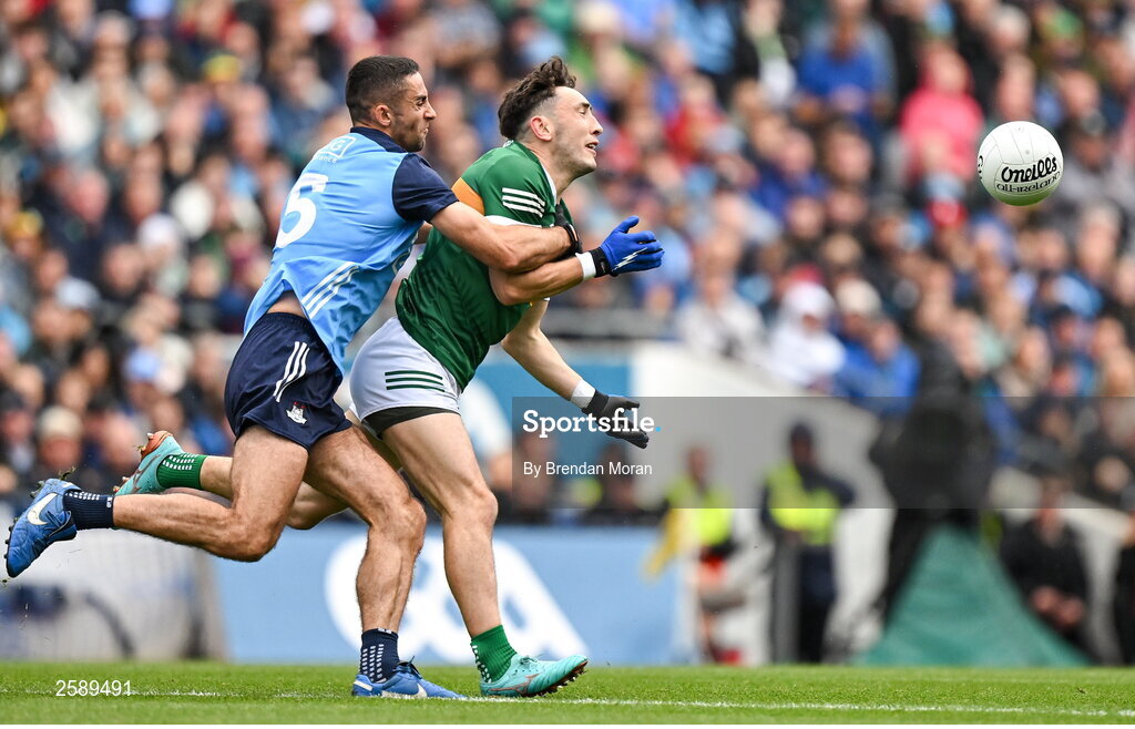 30 July 2023; Paudie Clifford of Kerry is tackled by James McCarthy of Dublin during the GAA Football All-Ireland Senior Championship final match between Dublin and Kerry at Croke Park in Dublin. Photo by Brendan Moran/Sportsfile