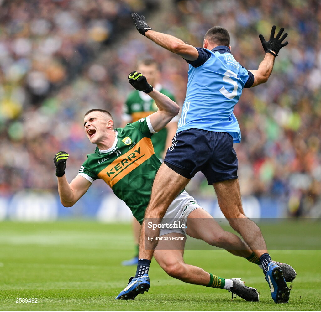 30 July 2023; Sean O'Shea of Kerry is tackled by James McCarthy of Dublin during the GAA Football All-Ireland Senior Championship final match between Dublin and Kerry at Croke Park in Dublin. Photo by Brendan Moran/Sportsfile