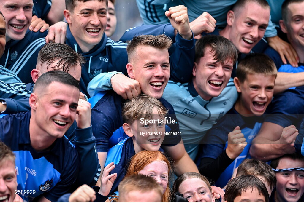 30 July 2023; Daire Newcombe of Dublin, centre, after his side's victory in the GAA Football All-Ireland Senior Championship final match between Dublin and Kerry at Croke Park in Dublin. Photo by Piaras Ó Mídheach/Sportsfile