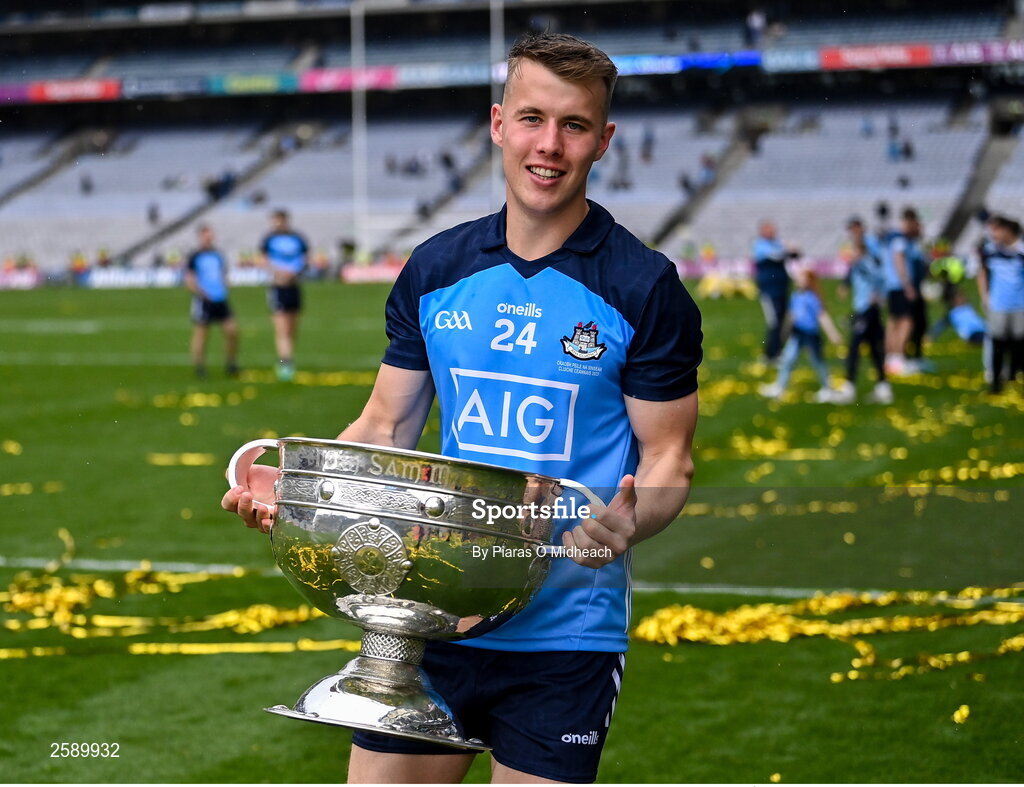 30 July 2023; Daire Newcombe of Dublin celebrates with the Sam Maguire Cup after his side's victory in the GAA Football All-Ireland Senior Championship final match between Dublin and Kerry at Croke Park in Dublin. Photo by Piaras Ó Mídheach/Sportsfile