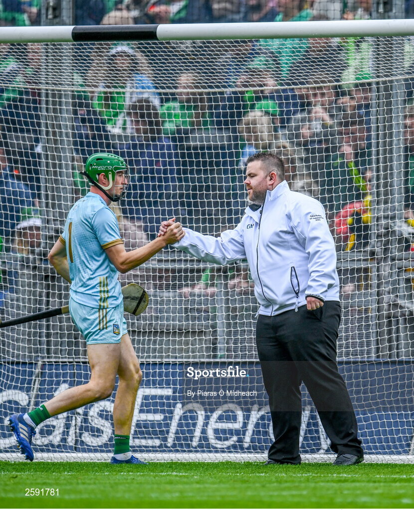 23 July 2023; Limerick goalkeeper shakes hands with umpire Tommy Redmond before the start of the second half the GAA Hurling All-Ireland Senior Championship final match between Kilkenny and Limerick at Croke Park in Dublin. Photo by Piaras Ó Mídheach/Sportsfile