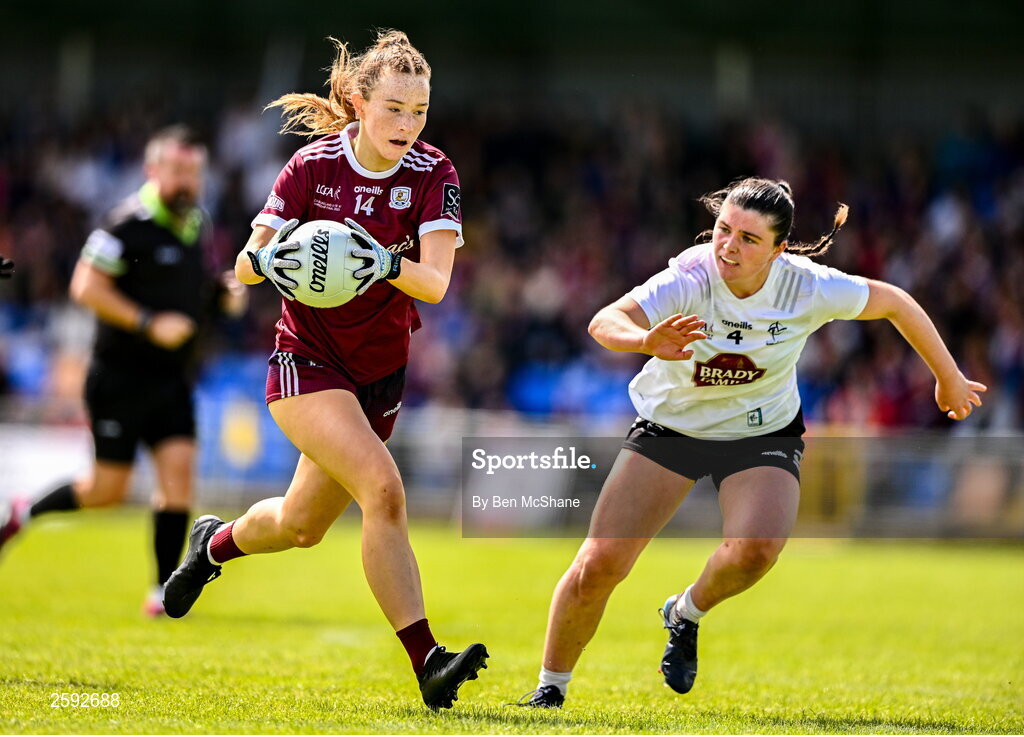 5 August 2023; Niamh Divilly of Galway in action against Zara Hurley of Kildare during the ZuCar All-Ireland Ladies Football U18 A final match between Galway and Kildare at Glennon Brothers Pearse Park in Longford. Photo by Ben McShane/Sportsfile
