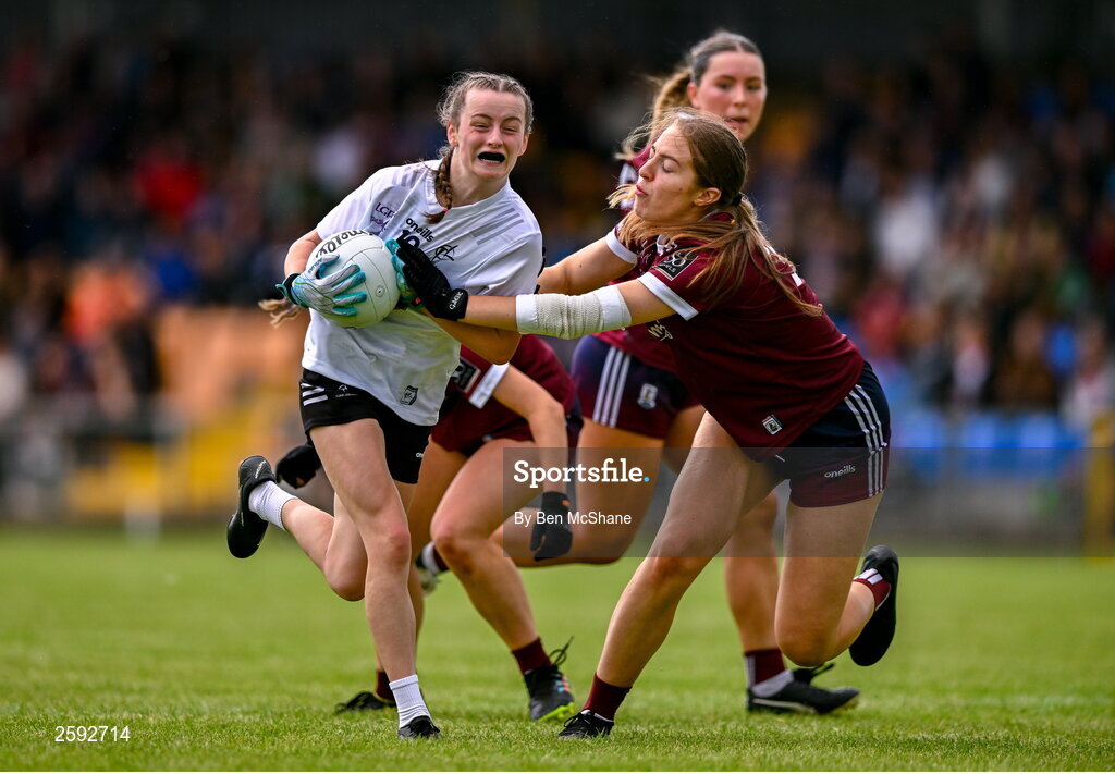 5 August 2023; Edwina Birchall of Kildare in action against Maryanne Jordan of Galway during the ZuCar All-Ireland Ladies Football U18 A final match between Galway and Kildare at Glennon Brothers Pearse Park in Longford. Photo by Ben McShane/Sportsfile