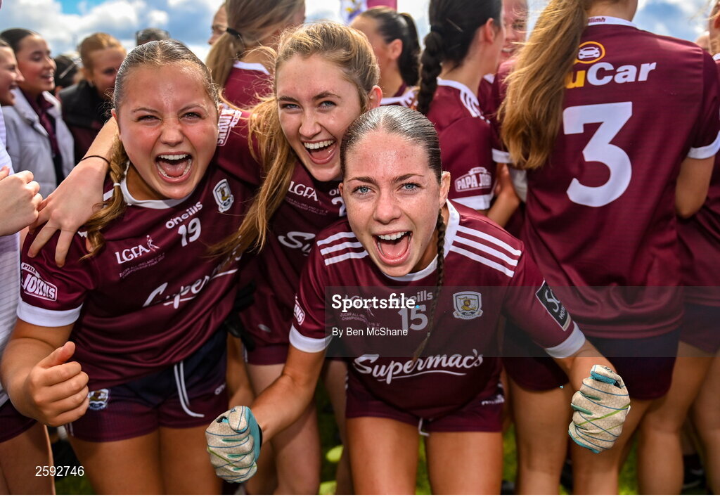 5 August 2023; Galway players, from left, Neasa Daly, Shíofra Ní Scanláin and Kate Thompson celebrate after the ZuCar All-Ireland Ladies Football U18 A final match between Galway and Kildare at Glennon Brothers Pearse Park in Longford. Photo by Ben McShane/Sportsfile