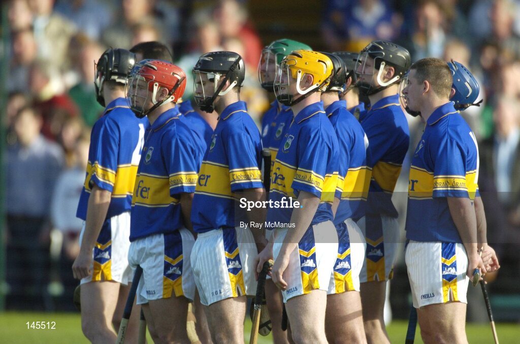 26 June 2004; The Tipperary team stand for the national anthem. Guinness Senior Hurling Championship Qualifier, Round 1, Limerick v Tipperary, Gaelic Grounds, Limerick. Picture credit; Ray McManus / SPORTSFILE