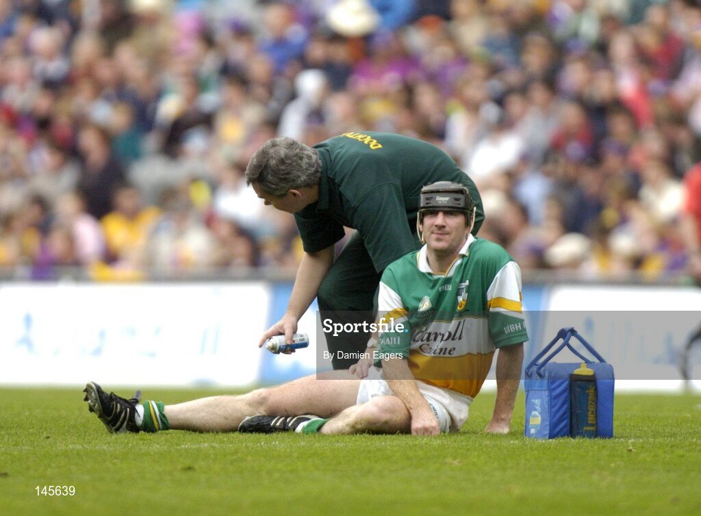 4 July 2004; Offaly's Brian Whelahan is treated by the Offaly doctor, he later left the field due to this injury. Guinness Leinster Senior Hurling Championship Final, Offaly v Wexford, Croke Park, Dublin. Picture credit; Damien Eagers / SPORTSFILE
