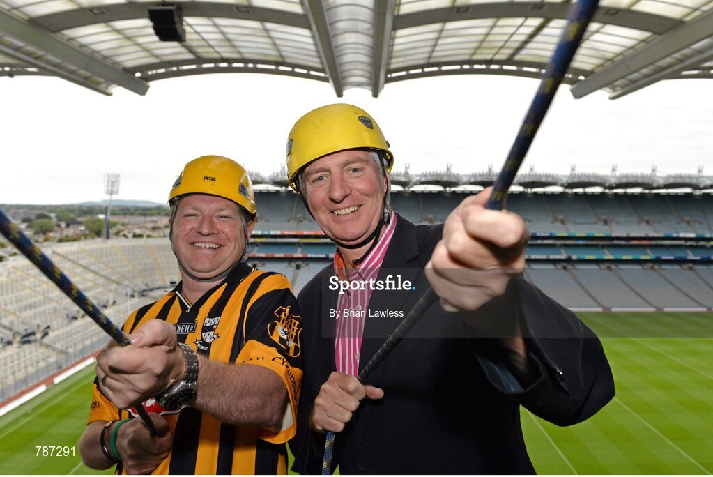 28 August 2013; The Sunday Game Presenter Michael Lyster was joined today in Croke Park by motor neurone disease (MND) sufferer Paul Lannon and friends sporting their county colours to encourage others from across Ireland to abseil 100ft off the Hogan Stand in aid of the Irish Motor Neurone Disease Association (IMNDA). At the event is Michael Lyster with Paul Lannon, from Knocktopher, Co. Kilkenny, left. Croke Park, Dublin. Picture credit: Brian Lawless / SPORTSFILE
