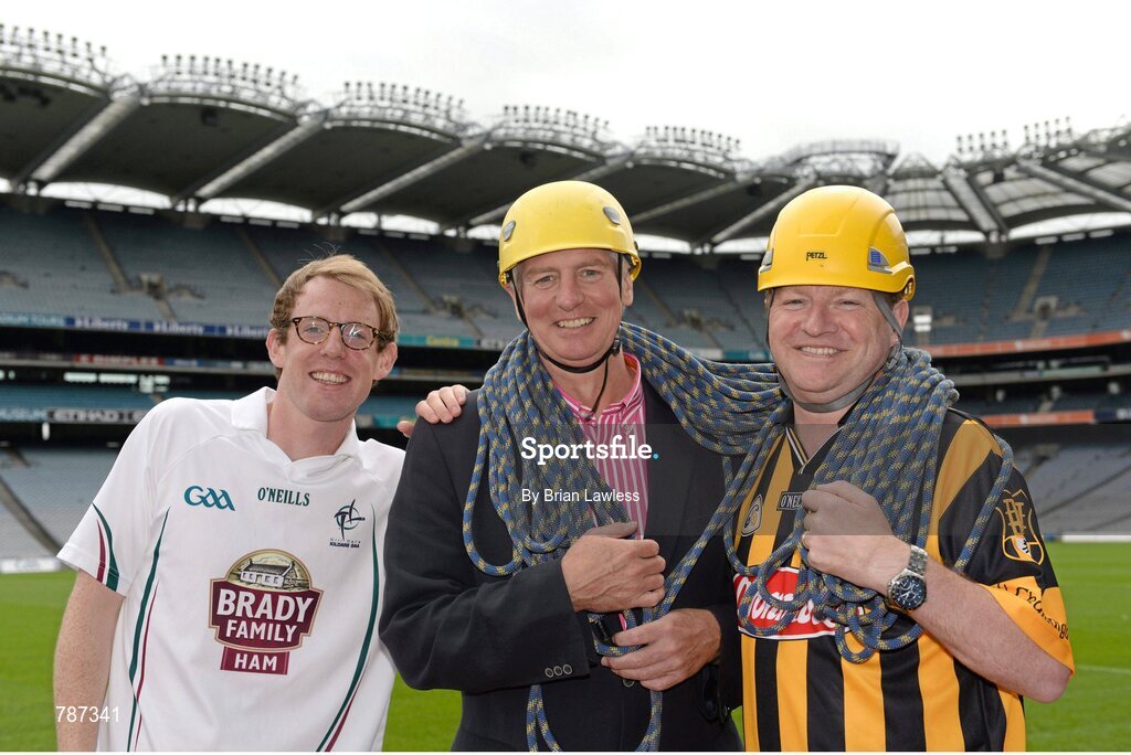 28 August 2013; The Sunday Game Presenter Michael Lyster was joined today in Croke Park by motor neurone disease (MND) sufferer Paul Lannon and friends sporting their county colours to encourage others from across Ireland to abseil 100ft off the Hogan Stand in aid of the Irish Motor Neurone Disease Association (IMNDA). At the event is Michael Lyster and Paul Lannon, from Knocktopher, Co. Kilkenny, with Kildare supporter Conor Leahy, from Naas. Croke Park, Dublin. Picture credit: Brian Lawless / SPORTSFILE
