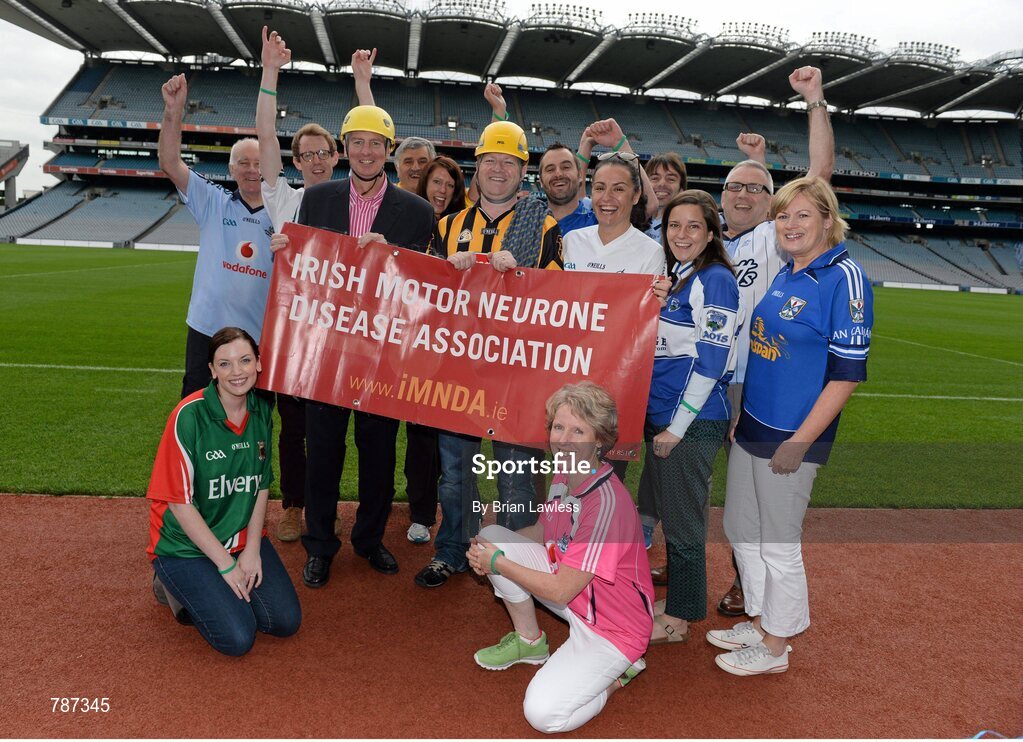 28 August 2013; The Sunday Game Presenter Michael Lyster was joined today in Croke Park by motor neurone disease (MND) sufferer Paul Lannon and friends sporting their county colours to encourage others from across Ireland to abseil 100ft off the Hogan Stand in aid of the Irish Motor Neurone Disease Association (IMNDA). At the event is Michael Lyster, Paul Lannon, from Knocktopher, Co. Kilkenny, and GAA supporters. Croke Park, Dublin. Picture credit: Brian Lawless / SPORTSFILE