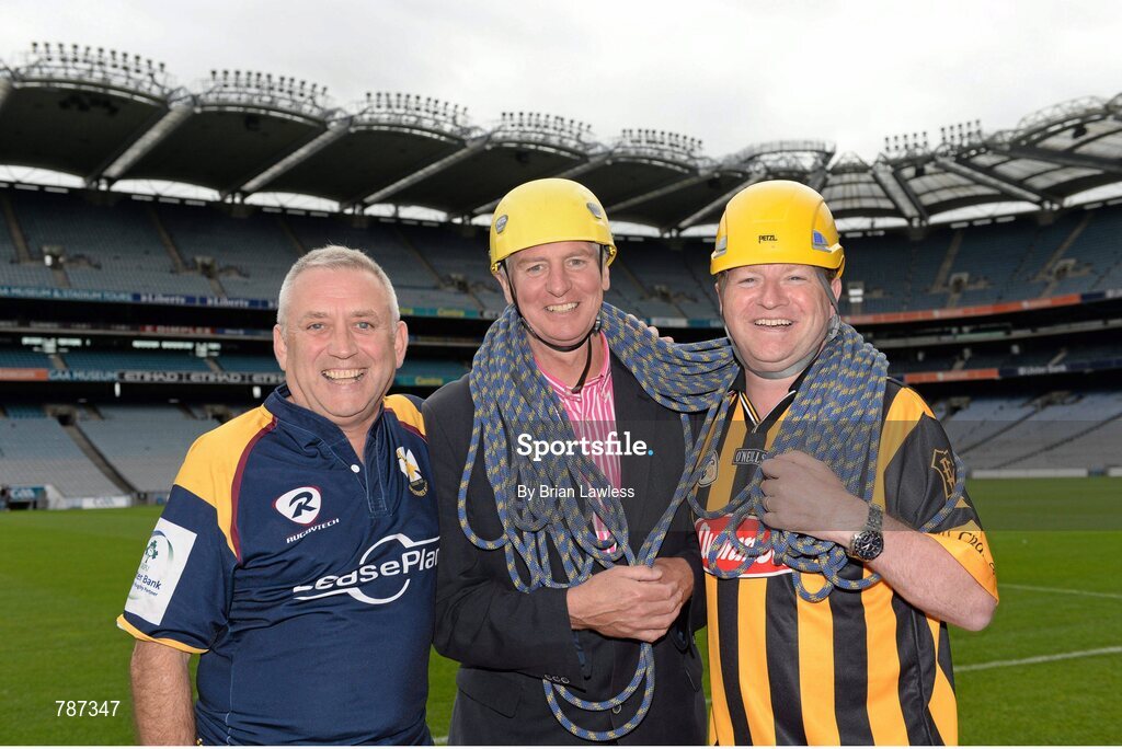 28 August 2013; The Sunday Game Presenter Michael Lyster was joined today in Croke Park by motor neurone disease (MND) sufferer Paul Lannon and friends sporting their county colours to encourage others from across Ireland to abseil 100ft off the Hogan Stand in aid of the Irish Motor Neurone Disease Association (IMNDA). At the event is Michael Lyster with Paul Lannon, from Knocktopher, Co. Kilkenny. Croke Park, Dublin. Picture credit: Brian Lawless / SPORTSFILE