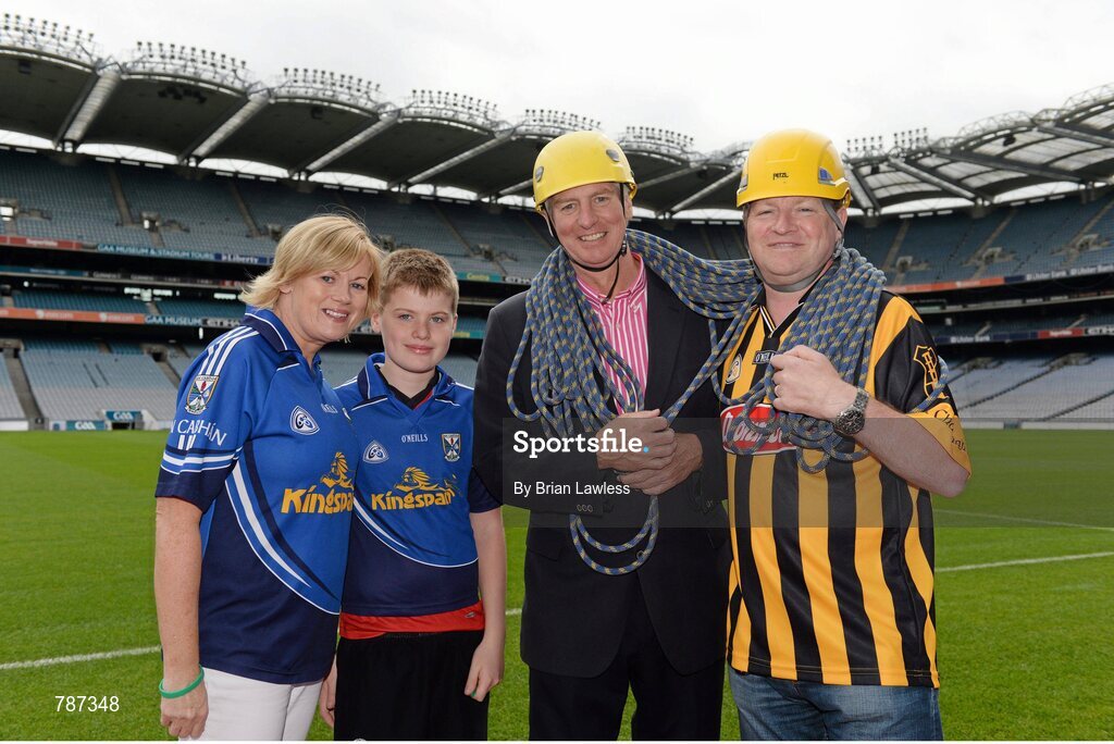 28 August 2013; The Sunday Game Presenter Michael Lyster was joined today in Croke Park by motor neurone disease (MND) sufferer Paul Lannon and friends sporting their county colours to encourage others from across Ireland to abseil 100ft off the Hogan Stand in aid of the Irish Motor Neurone Disease Association (IMNDA). At the event is Michael Lyster with Paul Lannon, from Knocktopher, Co. Kilkenny, left. Croke Park, Dublin. Picture credit: Brian Lawless / SPORTSFILE