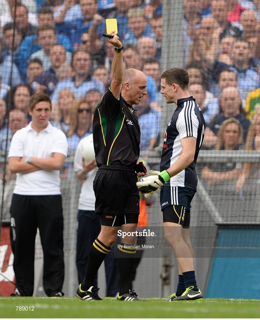 1 September 2013; Dublin goalkeeper and captain Stephen Cluxton is shown a yellow card by referee Cormac Reilly for a foul which resulted in a penalty to Kerry. GAA Football All-Ireland Senior Championship, Semi-Final, Dublin v Kerry, Croke Park, Dublin. Picture credit: Brendan Moran / SPORTSFILE