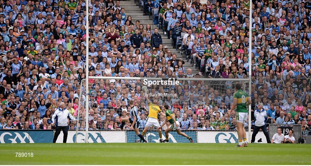 1 September 2013; Paul Mannion beats the Kerry goalkeeper, Brendan Kealy, to score the first Dublin goal. GAA Football All-Ireland Senior Championship, Semi-Final, Dublin v Kerry, Croke Park, Dublin. Picture credit: Ray McManus / SPORTSFILE