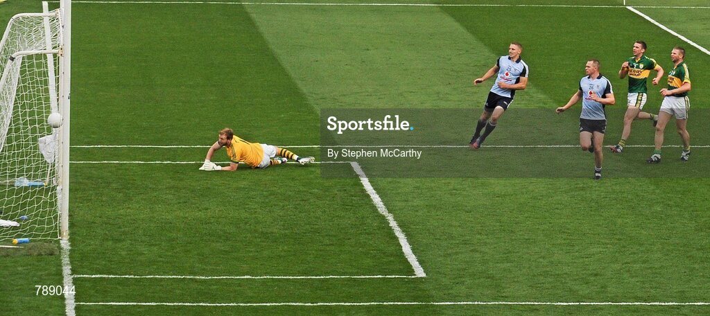 1 September 2013; Eoghan O'Gara, Dublin, scores his side's third goal past Kerry goalkeeper Brendan Kealy. GAA Football All-Ireland Senior Championship, Semi-Final, Dublin v Kerry, Croke Park, Dublin. Picture credit: Stephen McCarthy / SPORTSFILE